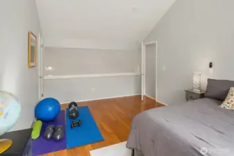 The loft wall could be enclosed and this room could be turned into a 6th bedroom since it has a closet