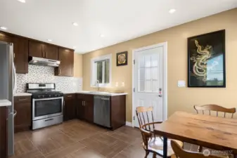 Kitchen opens to eating space and door opens to the deck for easy BBQs!