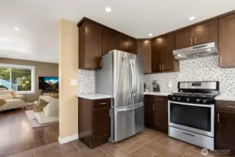 Bright and cheery kitchen with quality updates will delight the chef in the house.