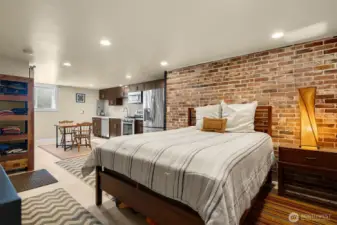 Lower MIL currently set up as a studio with high-end finishes & spacious kitchen.