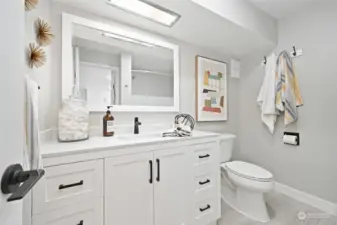 Updated bathroom and vanity with plenty of counter space and storage