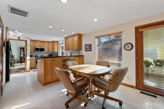 Welcome to this beautifully maintained West Campus home! Sunny eat in kitchen with induction stove, right off of the cheery sunroom and family room!