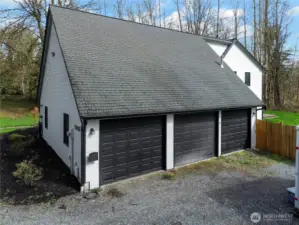 This is a massive 3 car garage. Must see in person