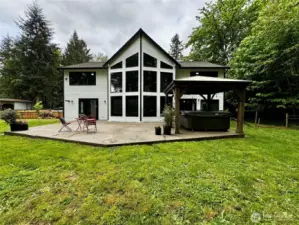 Back view of home, room for entertaining and relaxing