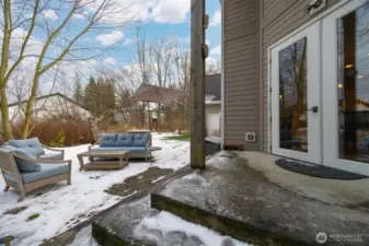 There is a large patio just off the French doors leading into the dining area and kitchen.