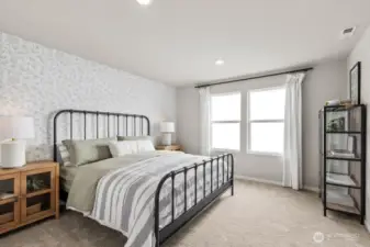 Primary bedroom on upper level. Pictures are representative of Burnham floorplan. Colors and options will vary. Photos from Model Home on 30. Homesite 77 is a mirror image.