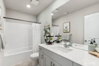 Full hall bathroom on upper level. Pictures are representative of Burnham floorplan. Colors and options will vary. Photos from Model Home on 30. Homesite 77 is a mirror image.