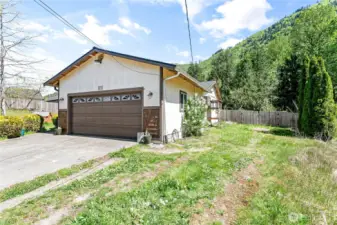 In addition to a two-car garage, the property includes parking for an RV or boat. Catio included!