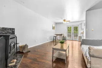 The spacious living room opens to a dining area, and is well designed for entertaining.