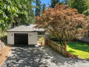 Oversized, 1-car garage with ample outdoor, additional parking.