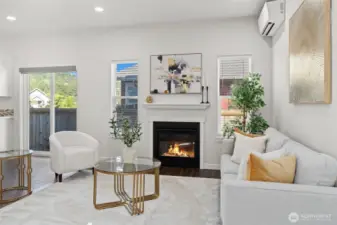 A cozy gas fireplace adds comfort and ambiance year-round.