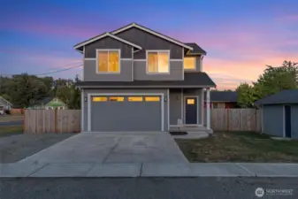 Spacious two-car garage provides secure parking, extra storage, and room for your gear or hobbies.