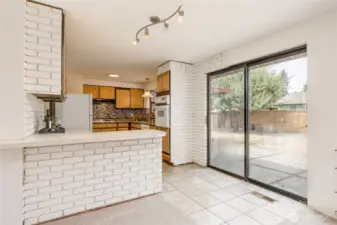 Breakfast bar and slider to the back patio