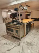 Custom range and large kitchen island