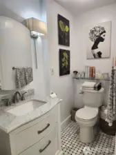 bathroom w/heat lamp marble tile floors