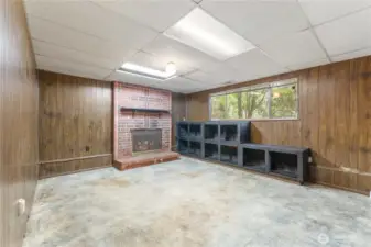 Downstairs bonus/family room with fireplace.