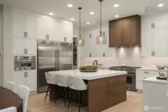 Chef's modern kitchen design with abundant storage and prep space.