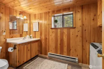 Bathroom on the main floor, includes washer and dryer.