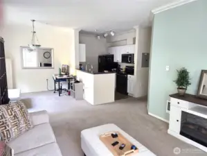 Great room with living room, dining room and kitchen