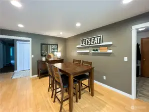 Informal eating area that is open to the entryway.