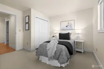 A second bedroom is located steps from a second full bathroom.