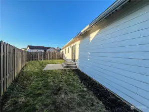 Back Yard with Patio completely fenced.