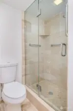 Guest bath shower and toilet.