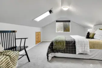 Upstairs bedroom with skylight