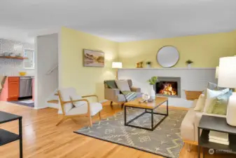 A nice cozy fireplace in this bright livingroom