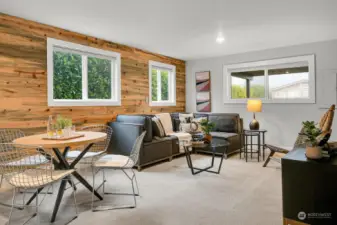 Large family room just a few steps down from the main floor. It can also be used a a fourth bedroom complete with a closet.