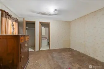 Primary bedroom and full bathroom walk-in closet