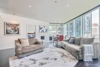 Large living room with floor to ceiling windows