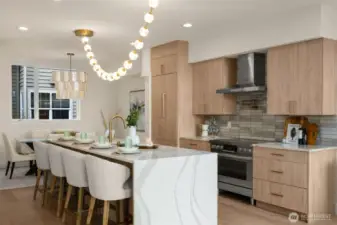 The heart of the home, a gourmet kitchen featuring Bosch appliances, quartz countertops, and custom cabinetry.