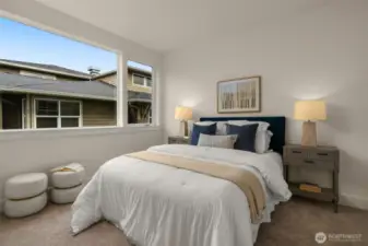 Guest bedroom offers privacy and comfort—ideal for visiting friends or family.