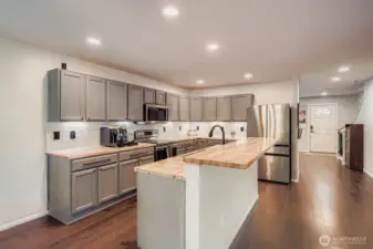 Open concept kitchen/living/dining