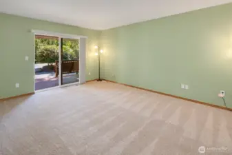 Primary has a sliding glass door that leads to a covered back deck.