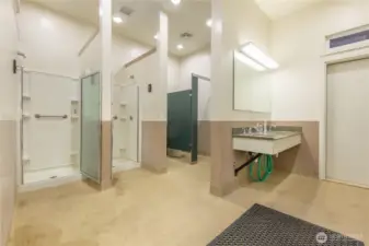 Men's shower and bathroom in clubhouse.