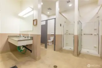 Women's shower and bathroom in clubhouse.