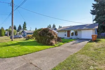 Front of house with driveway.