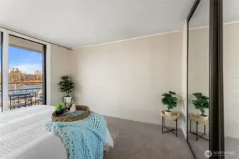 Spacious bedroom layout offering flexibility for seating, workspace, or additional storage.