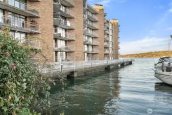 Spinnaker Bay waterfront living with private balconies and front-row marina views on Lake Washington.