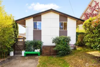 Classic 70's architecture, updated with Hardie Board siding and wooden soffits.