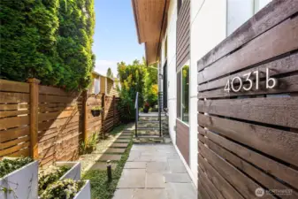 Custom pavers and gate to entryway