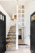 Welcoming entrance with landing leading up or downstairs