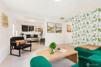 Light-filled daylight basement family room, with bonus area off utility room