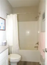 GUESTS HAVE A FULL BATH WITH OPTION OF A SHOWER OR TUB!