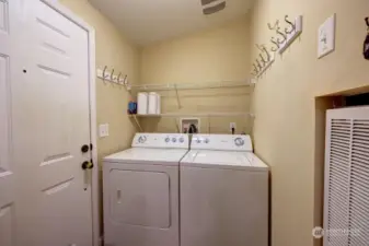 Laundry room.  The door leads to the backyard.