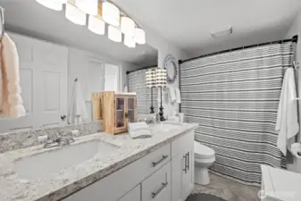 Updated full bath off primary bedroom.