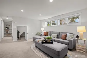Recreation/bonus room with large under stair storage closet.