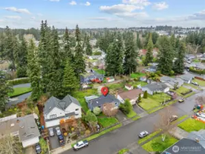 On location birds eye view with community surroundings. This location offers convenience and connectivity.